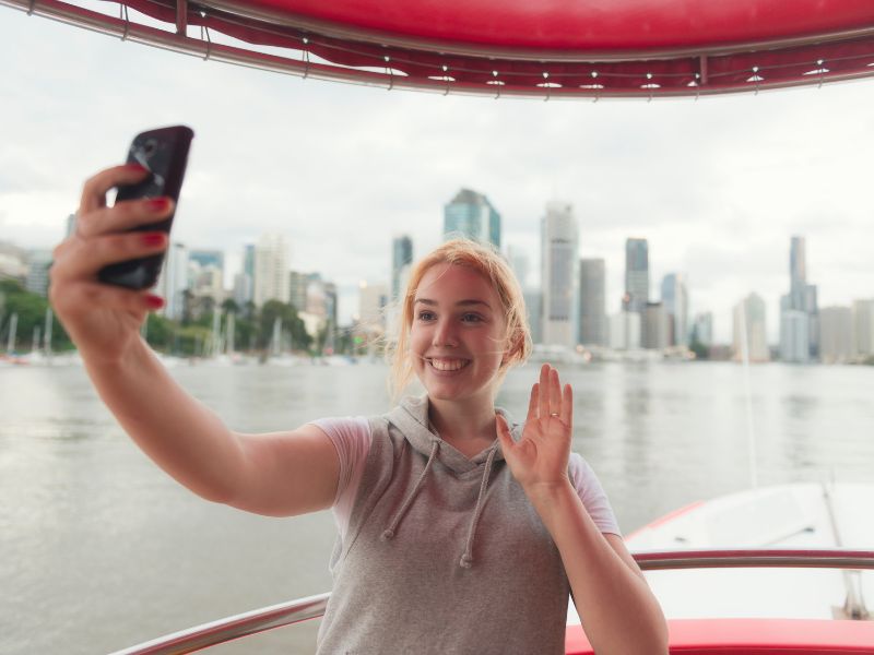 Woman taking selfie on Brisbane River